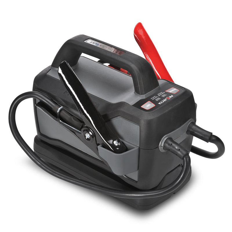 A black Projecta IS1500 12V 1500A Intelli-Start Emergency Lithium Jump Starter with red and black cables and a docking station.