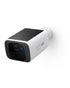 Camera angled to the left on its white wall mount, solar panel on top, plain white backdrop