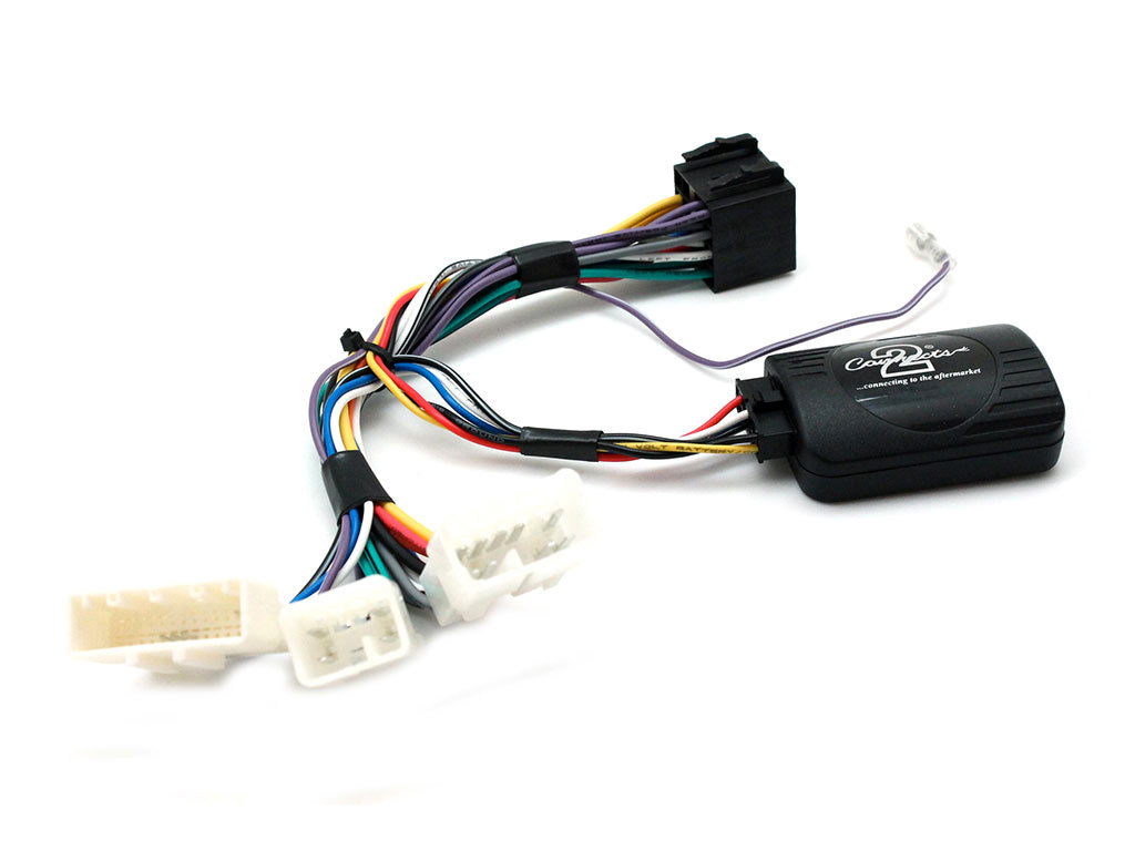 Small black module on a coloured loom with several white vehicle plugs and one black plug at the far end