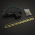 Mechanical parts including a black component, blue wires, and brass strip on a dark background