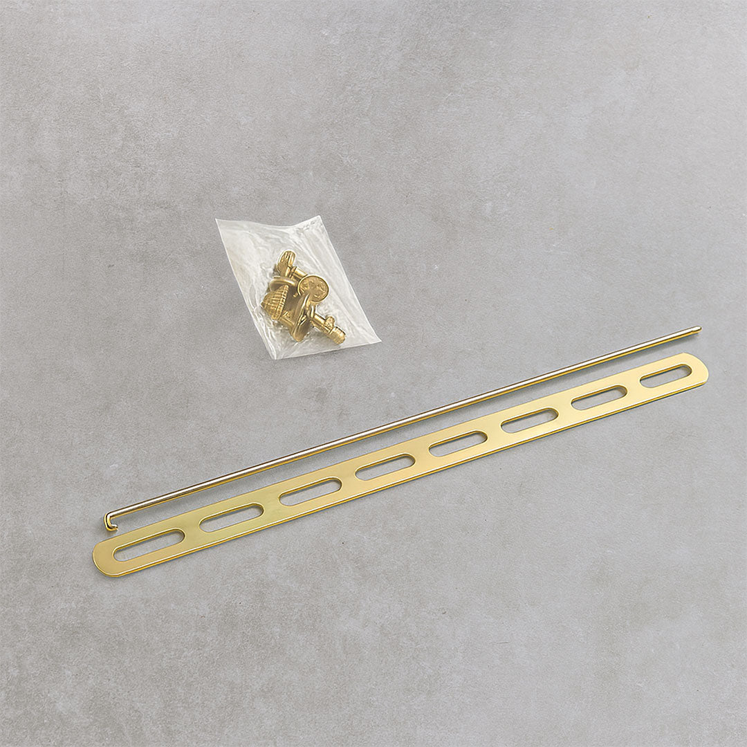 Gold metal strip with screws on a gray background