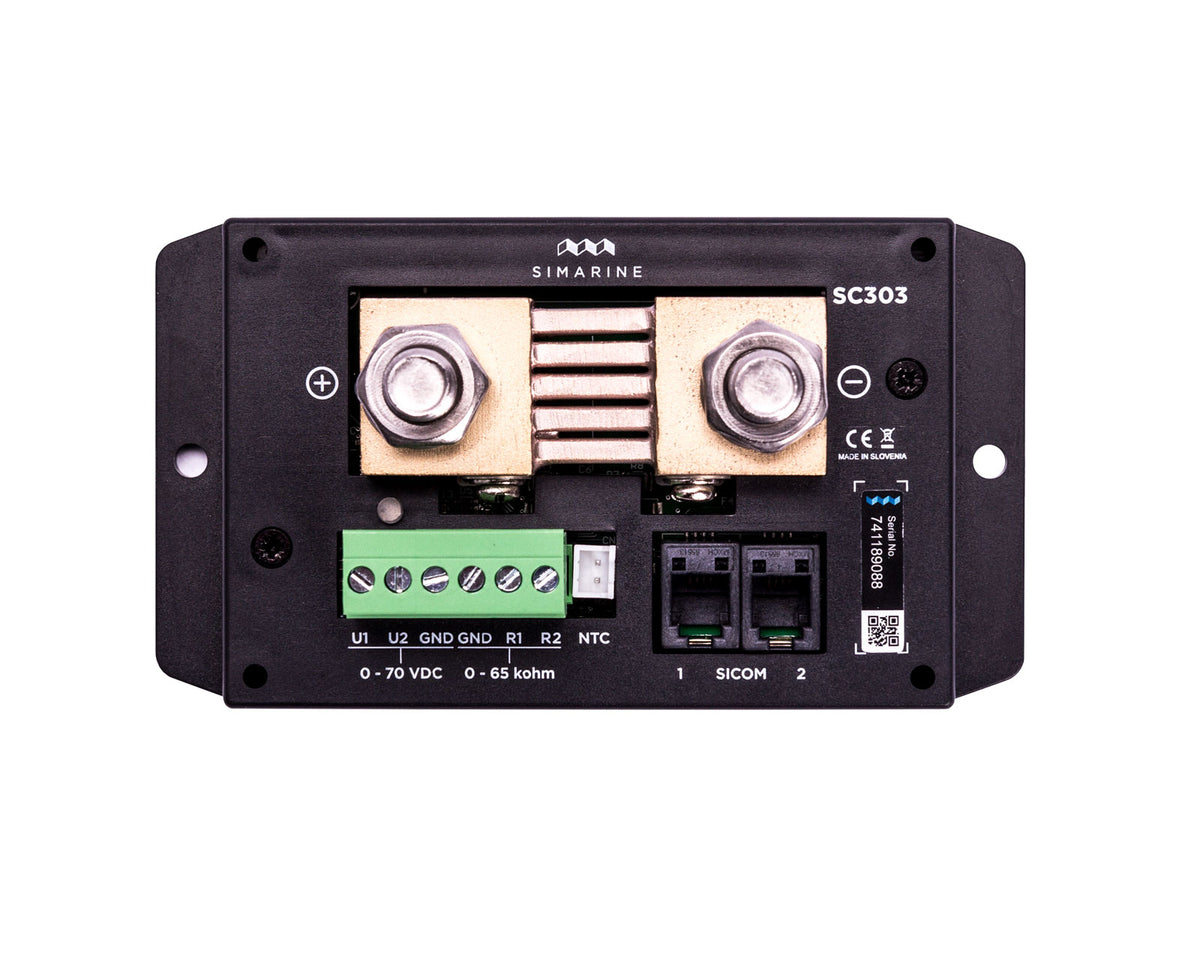 Shunt face on, showing the two stud terminals, green screw terminal block and two data sockets