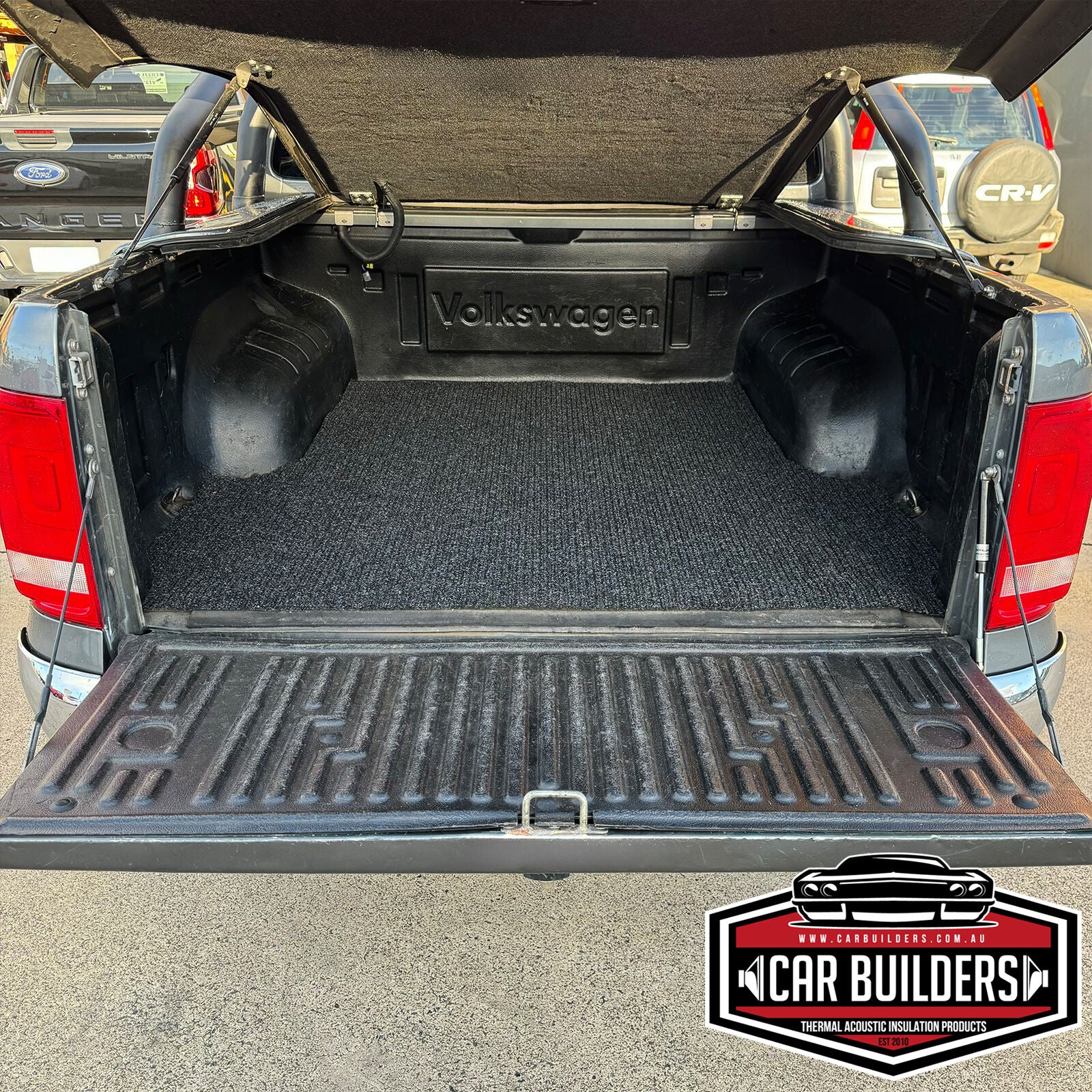 Marine carpet mat across the full width of an Amarok tub
