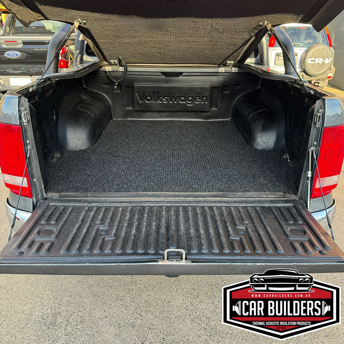 Marine carpet mat across the full width of an Amarok tub