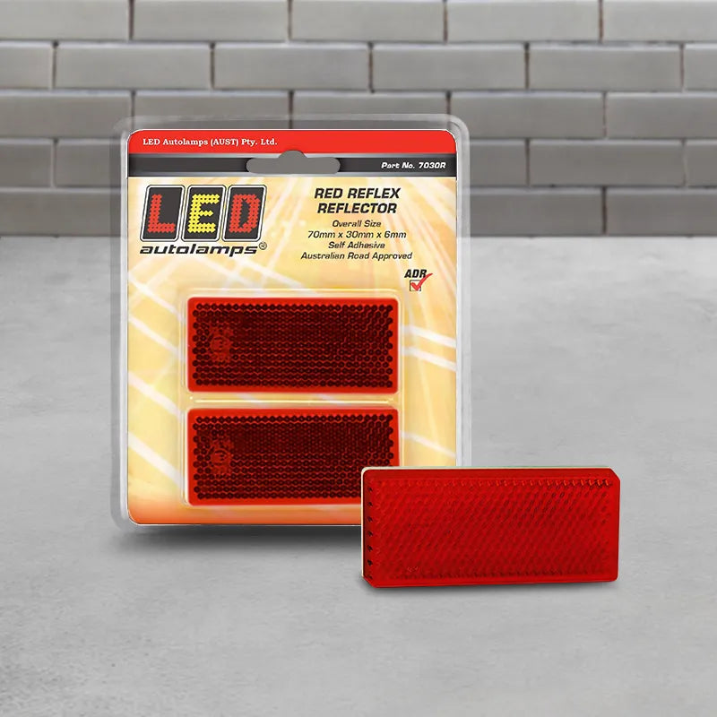 LED Autolamps 7030R Red Reflector Self Adhesive 70x30x6mm Twin Blister Pack