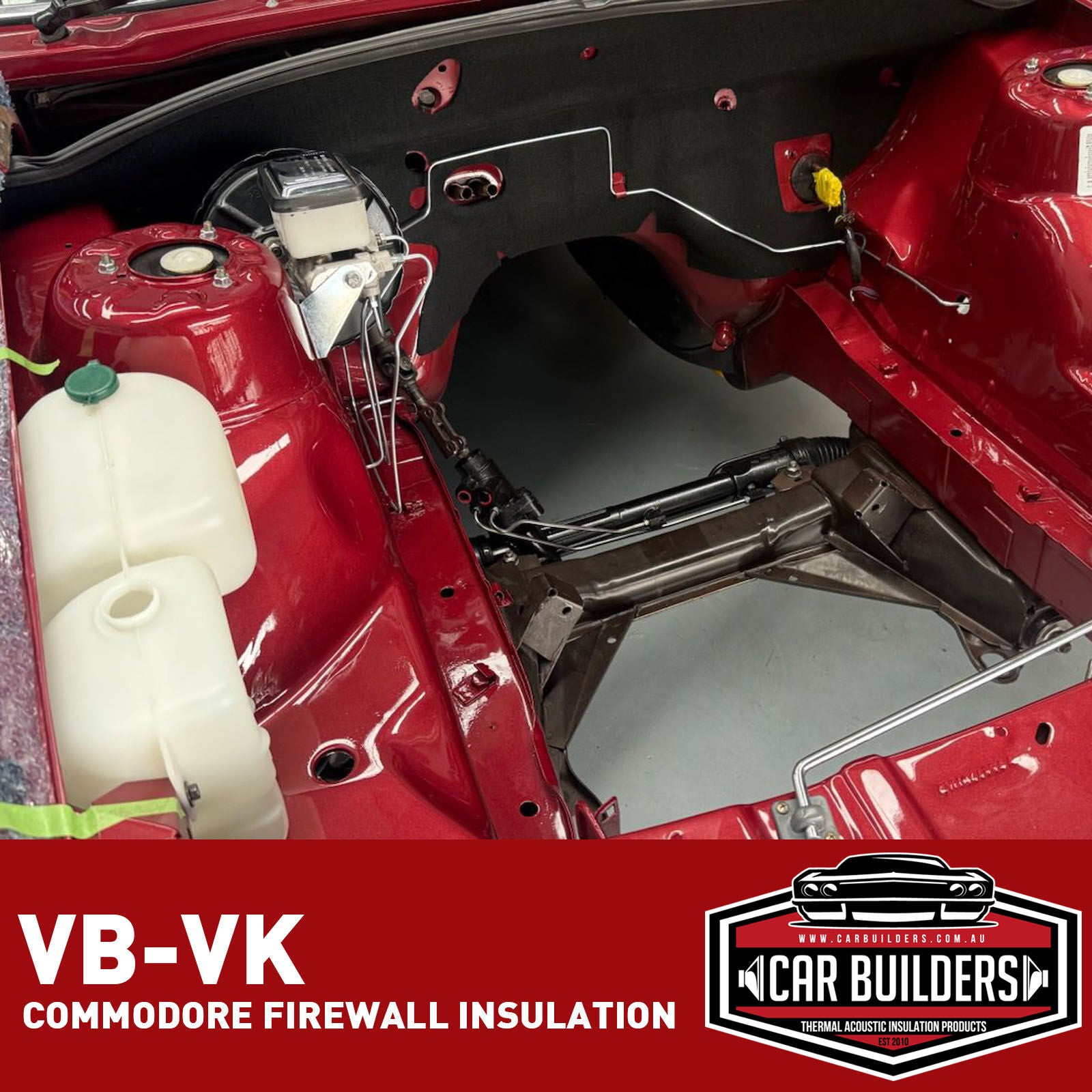 Red VB to VK Commodore engine bay with the black firewall insulation pad fitted