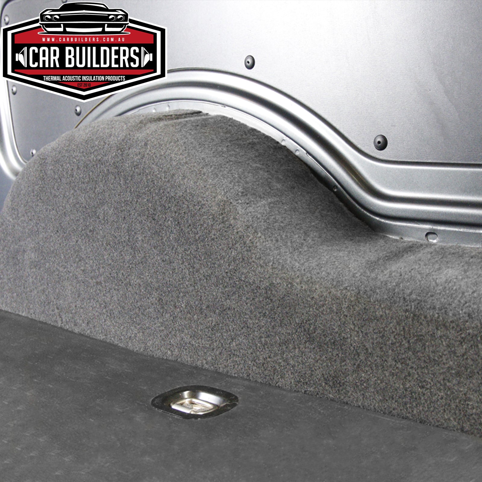 Stretch carpet lining a van wheel arch and side wall