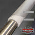 Close view of pipe shield on an exhaust pipe showing the aluminium outer and ceramic insulation