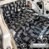 Dual cab floor pan and under seat area covered in black Stage 1 Sound Deadener sheets