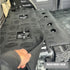 Grey Mass Noise Liner being rolled out over a deadened dual cab floor