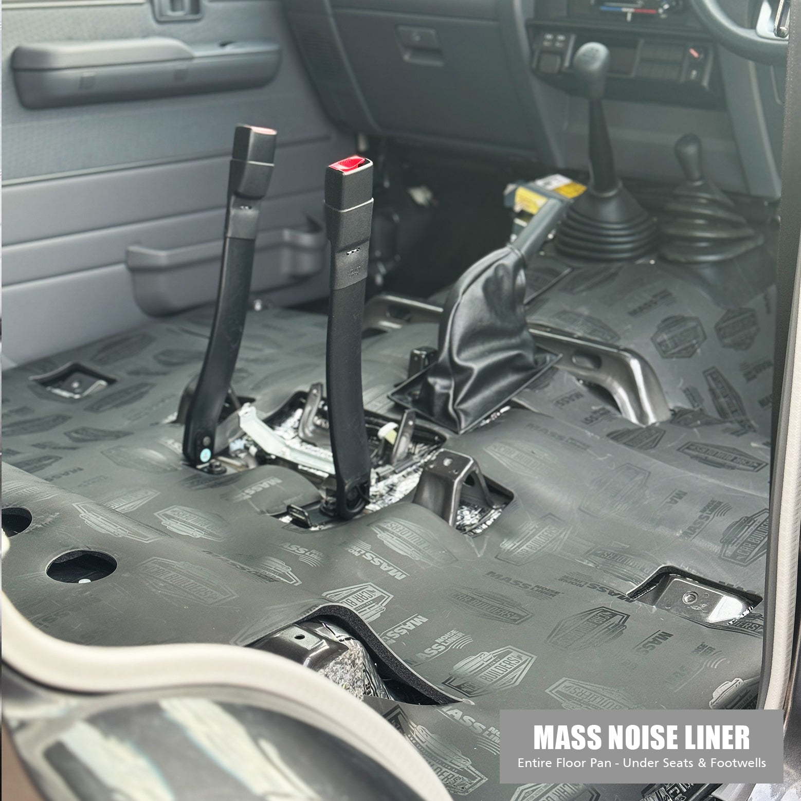 Mass Noise Liner cut around the seat belt mounts and gear levers in a dual cab