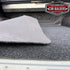 Corner of the D-MAX cargo mat lifted to show the backing