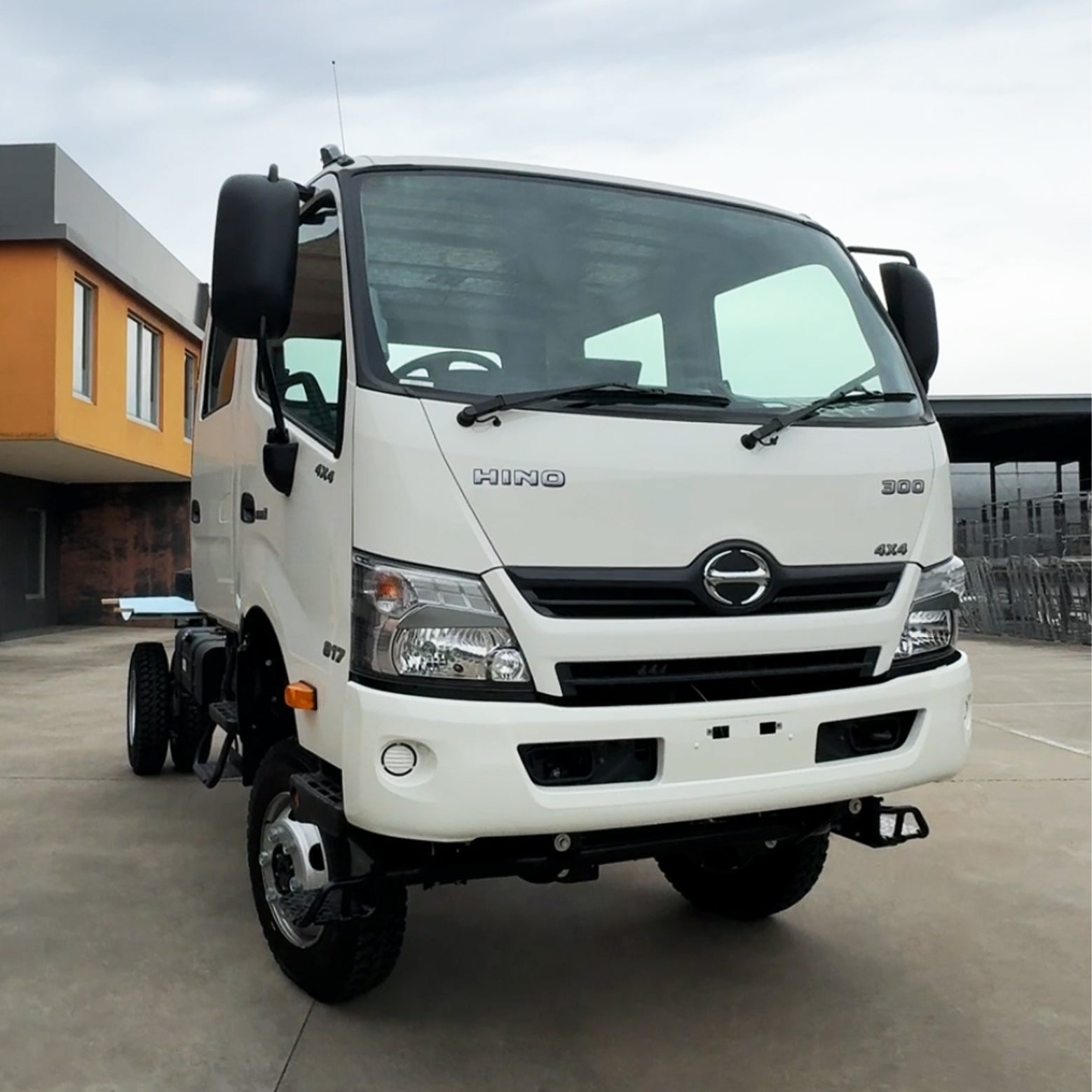 White Hino 300 Crew Cab truck, front three quarter view