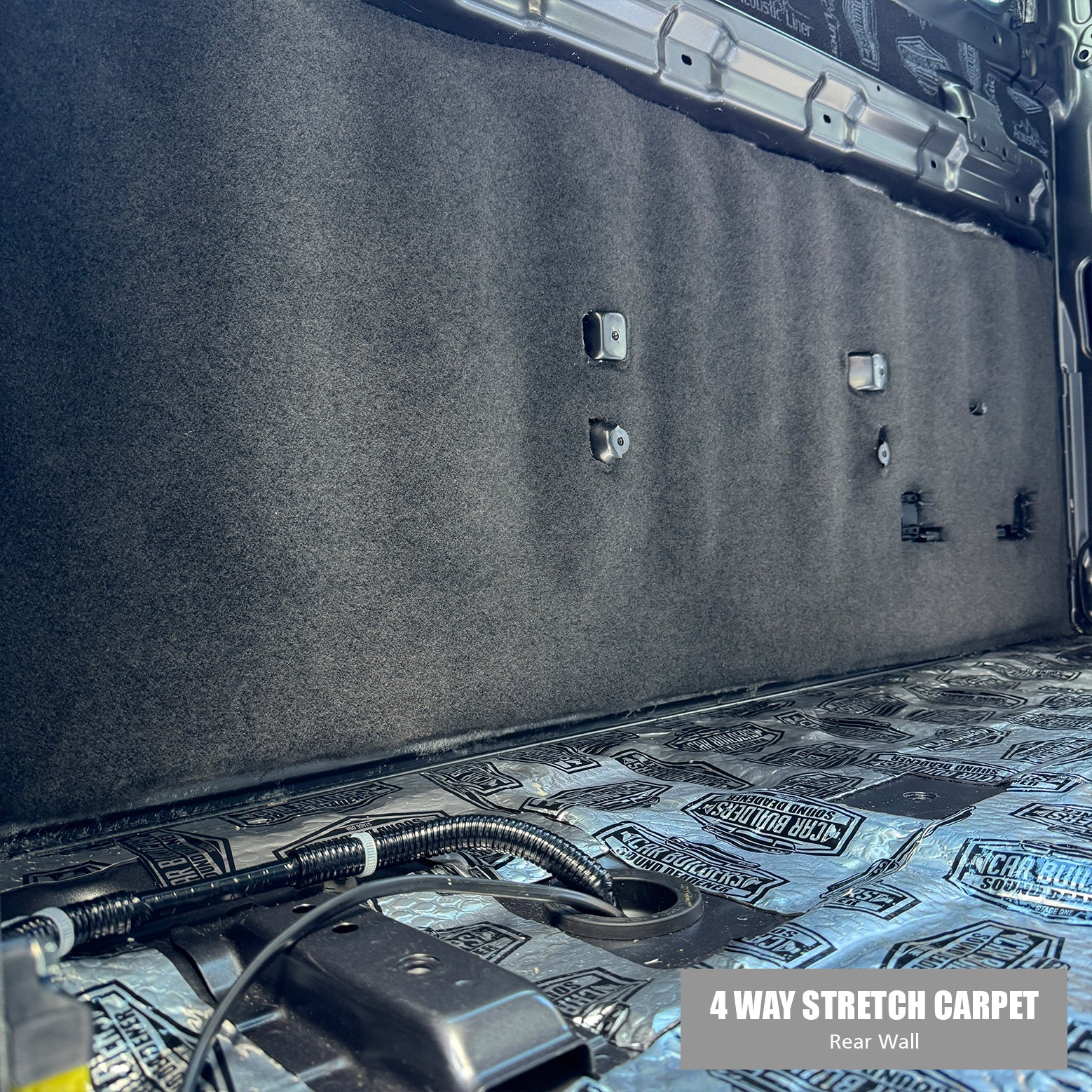 Four way stretch carpet glued to the rear wall of a 79 single cab