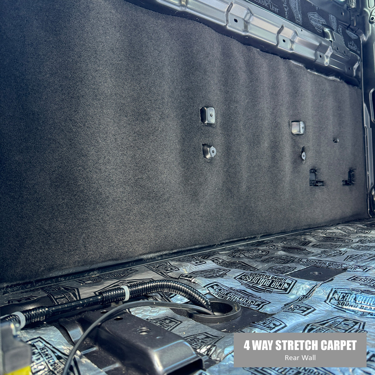 Four way stretch carpet glued to the rear wall of a 79 single cab
