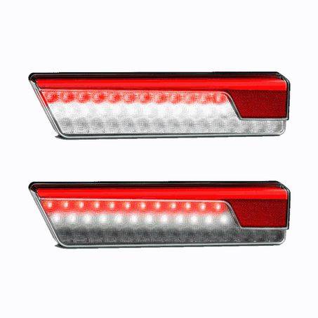 Pair of LED Autolamps multi-volt stop, tail, indicator, and reverse lights with red and white LEDs in black housing.