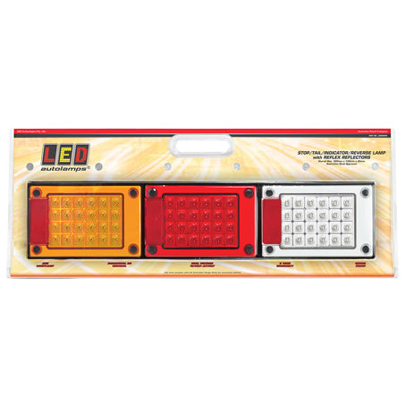 LED Autolamps J3BARWM multi-volt jumbo stop, tail, indicator, and reverse lamp assembly in packaging with red, yellow, and clear lenses.