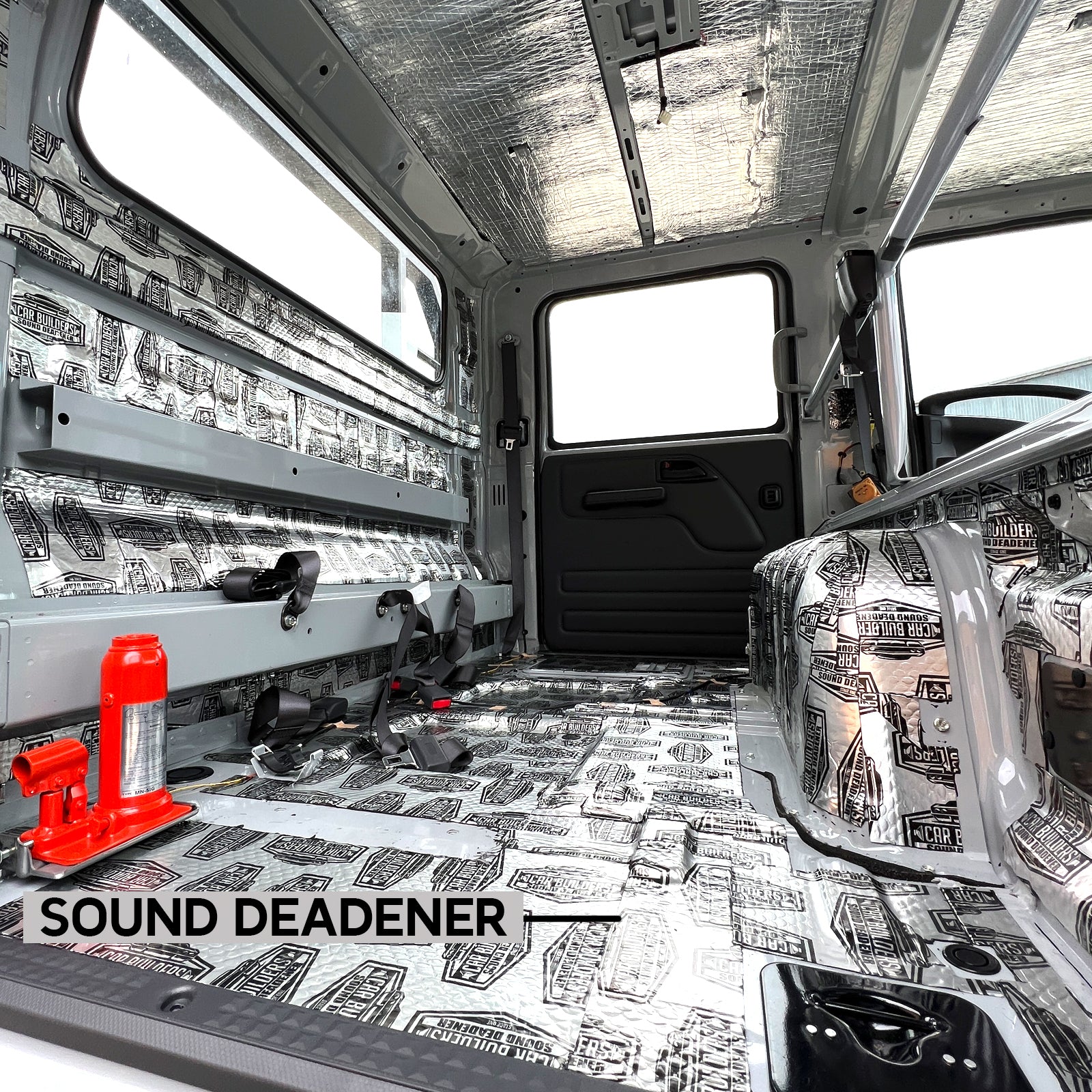 Stage 1 tiles on a truck cab floor and walls, shown on an Isuzu