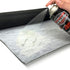 Spray adhesive applied to the textile back of Mass Loaded Vinyl