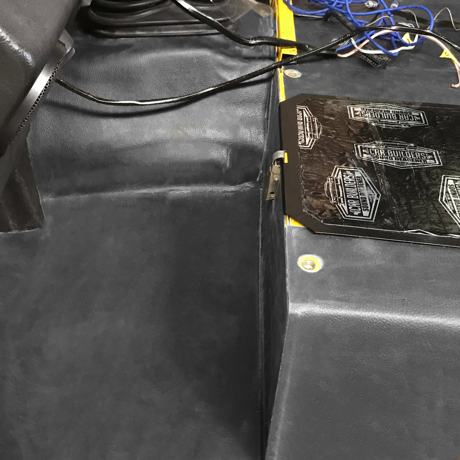 Mass Loaded Vinyl fitted over the floor pan of a vehicle