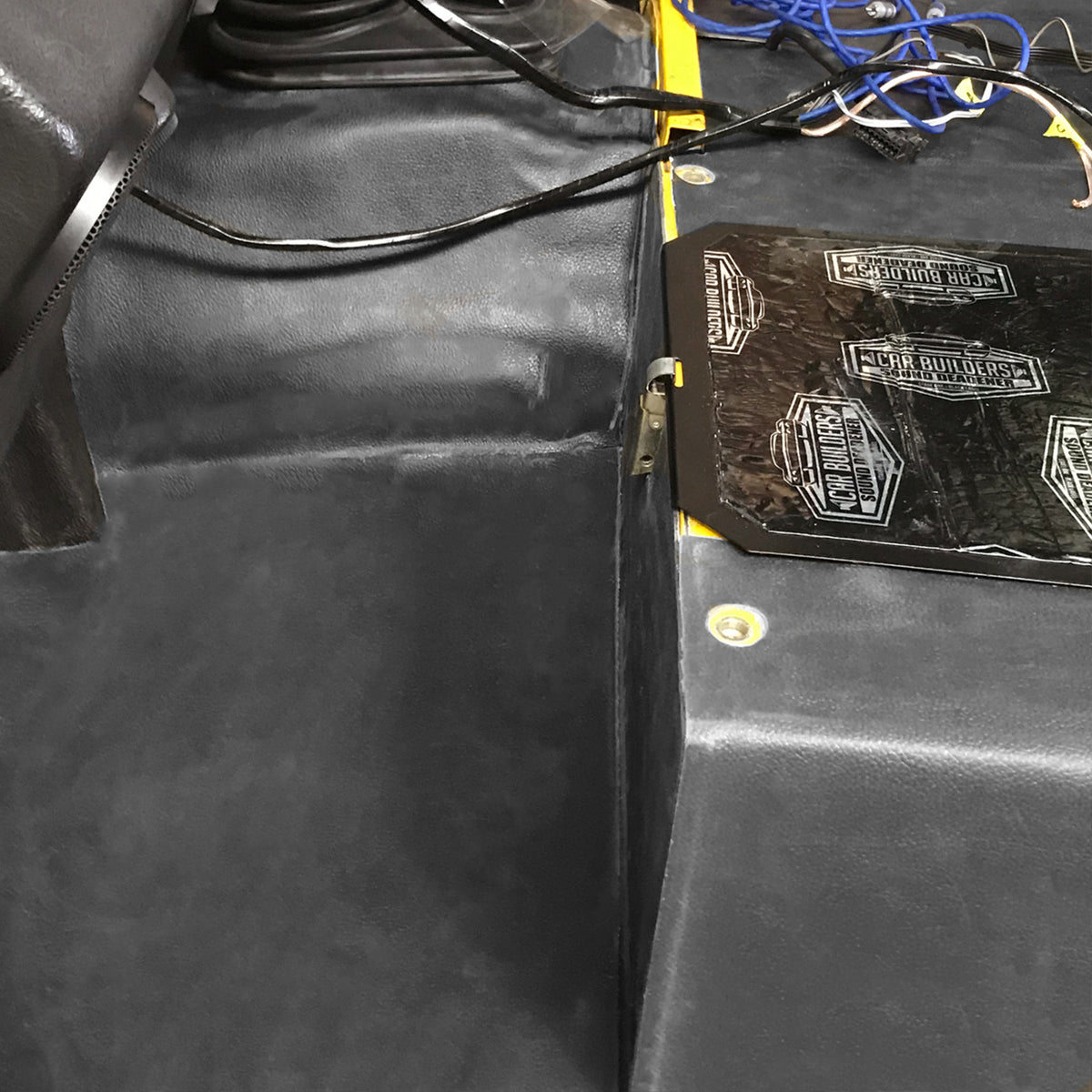 Mass Loaded Vinyl fitted over the floor pan of a vehicle