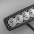Close view of the lens showing the LED chips behind each reflector