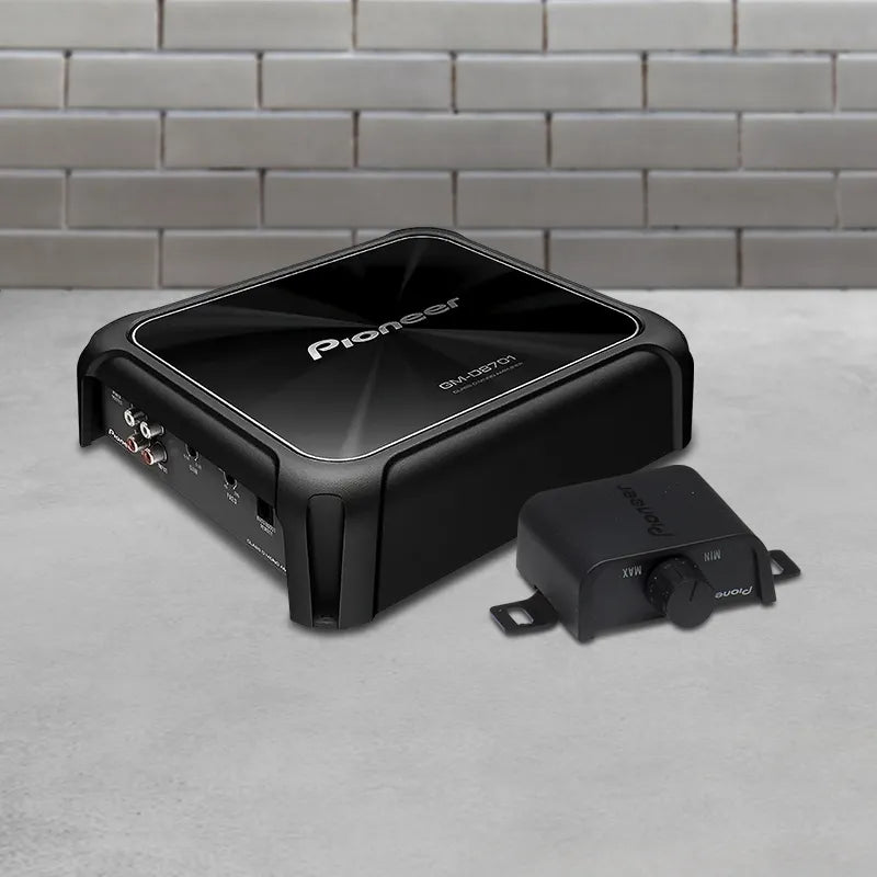 Pioneer GM-D8701 1600W Class-D Mono Car Amplifier with brick background
