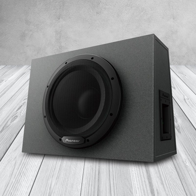 Pioneer TS-WX1210A 12" 1300W Sealed Enclosure Active Subwoofer With Built-In Amplifier side angle view with wood background 
