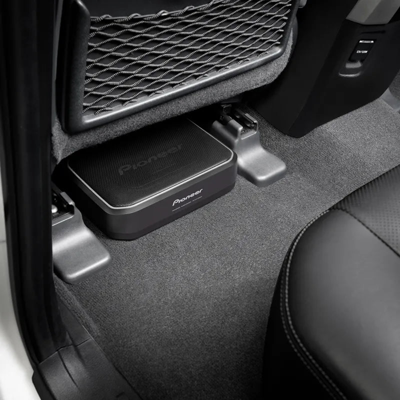 Pioneer TS-WX140DA 8" Space-Saving Amplified Compact Active Subwoofer showing below the car seat and more space efficiency 