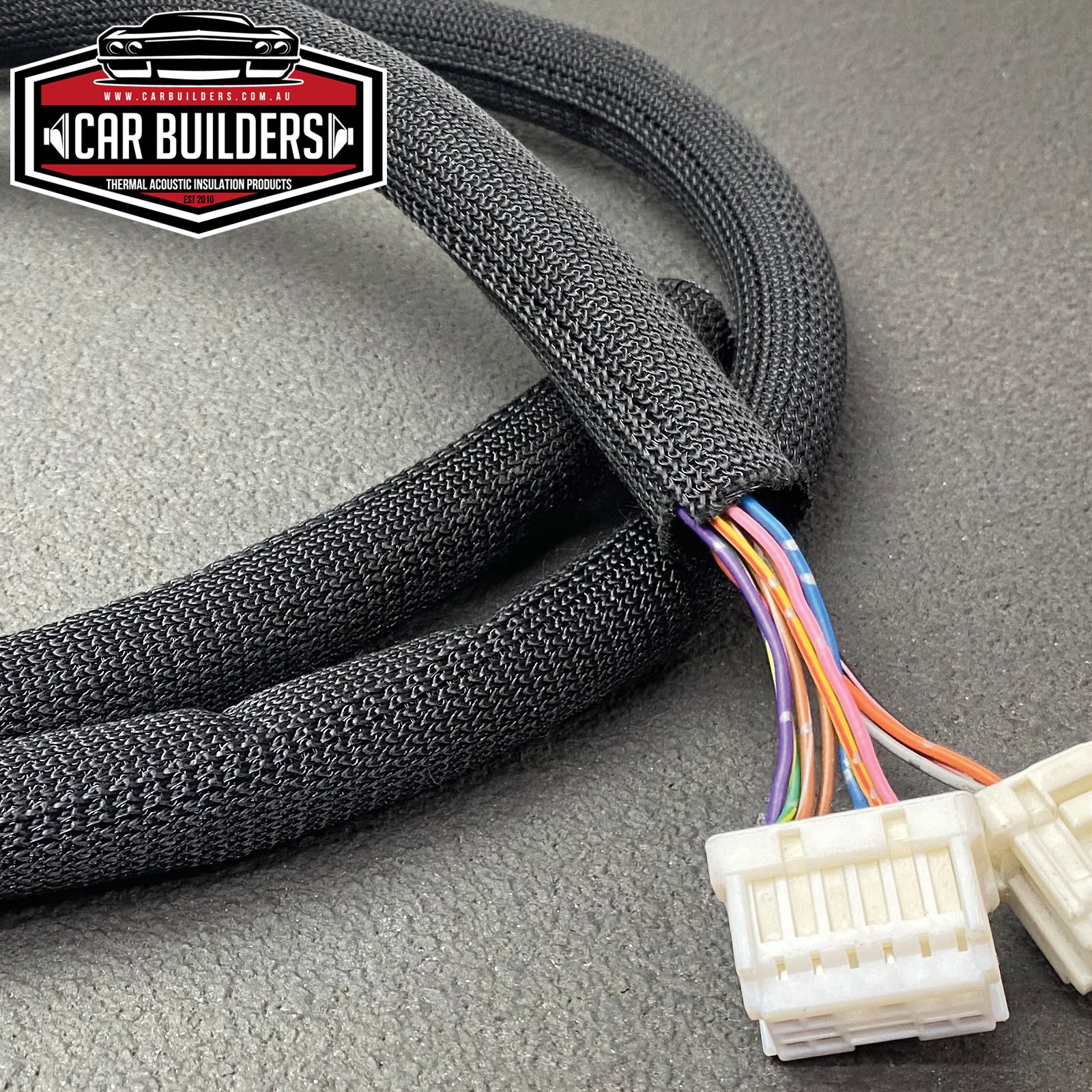 Pro Loom Heavy closing over coloured wires at a plug