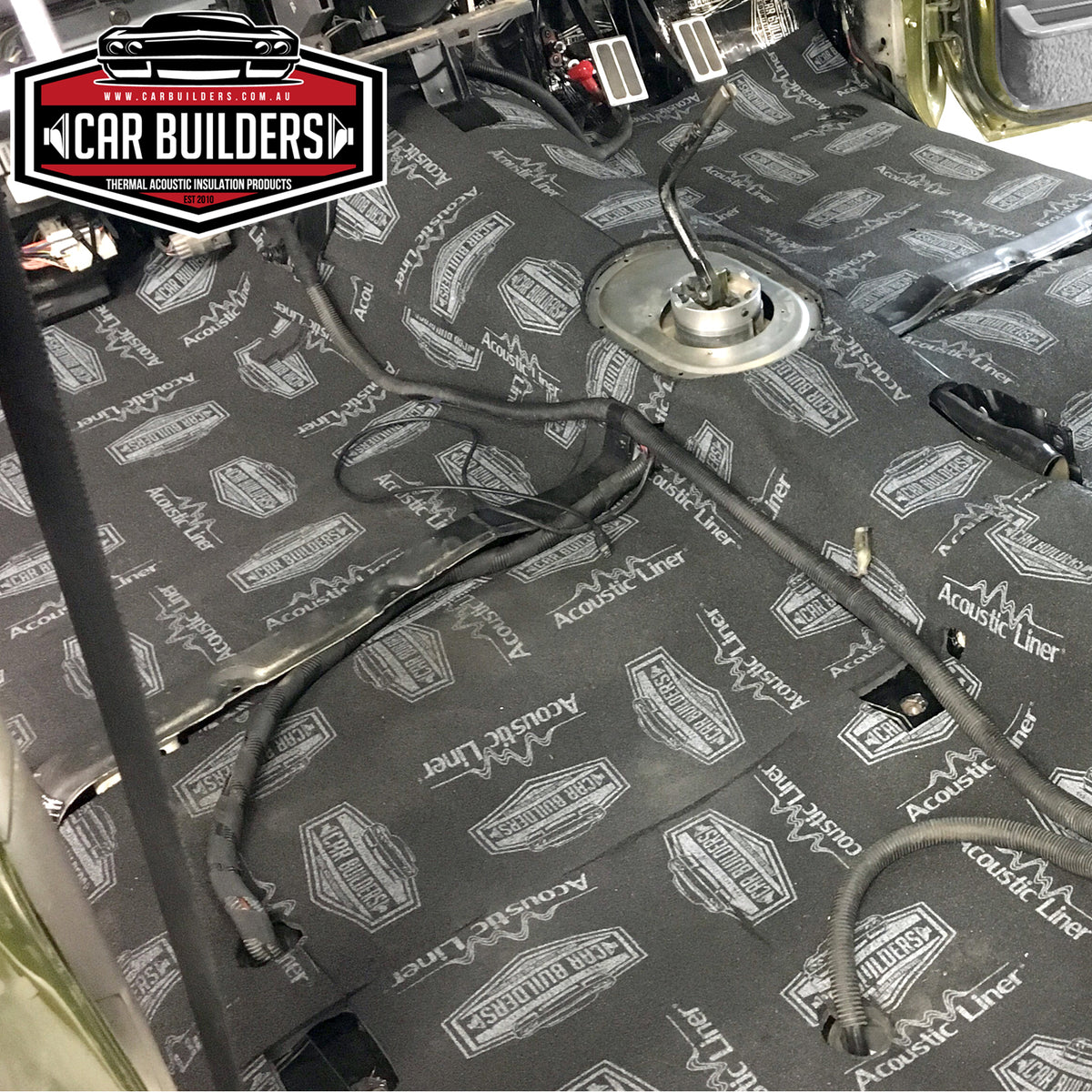 Panel van cab floor with Acoustic Liner stuck over the deadener