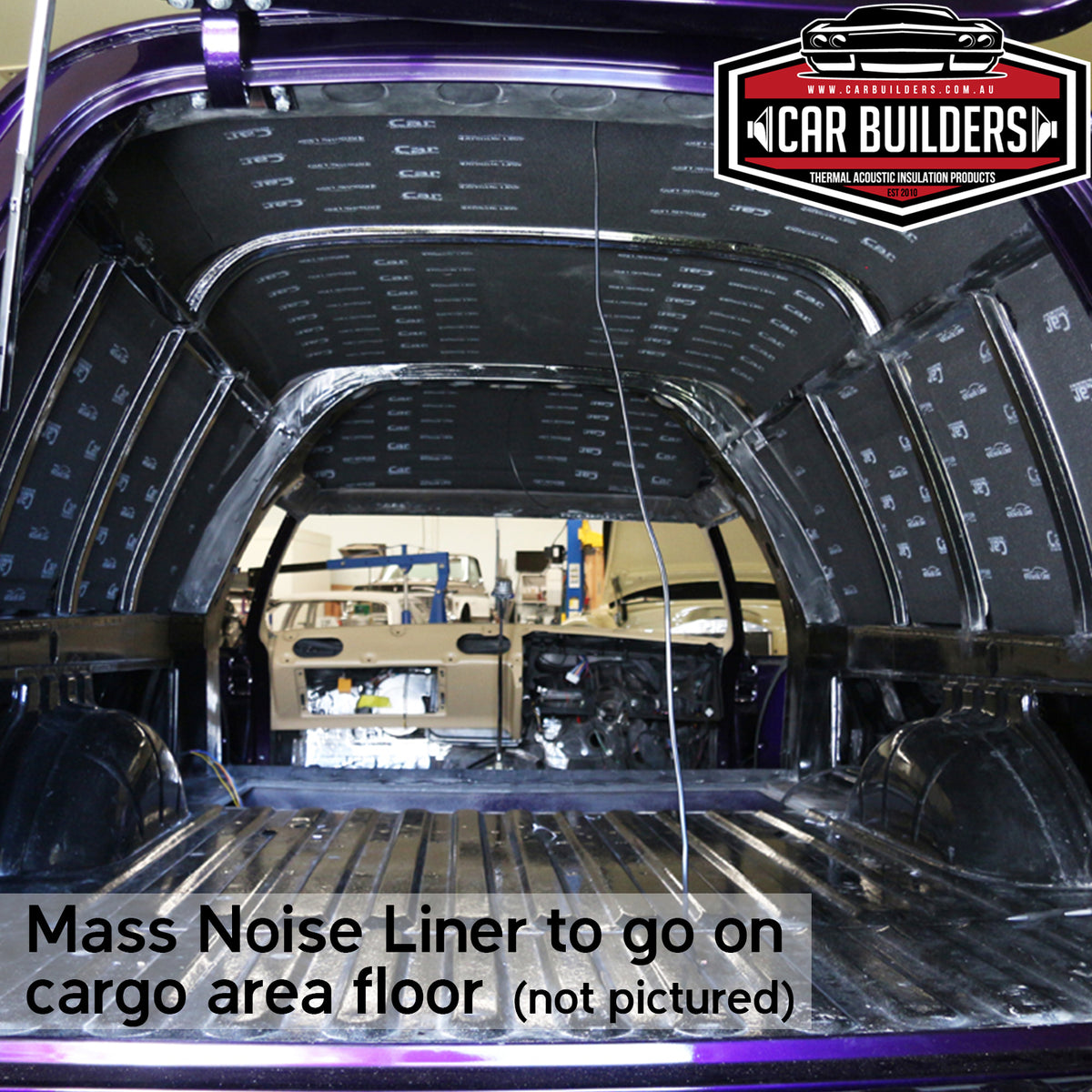 Panel van cargo bay with deadener on the side walls and wheel arches