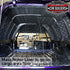 Panel van cargo bay with deadener on the side walls and wheel arches