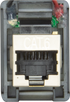 Rear of the switch with the CAT6 marked RJ45 socket and red and black wires at the top