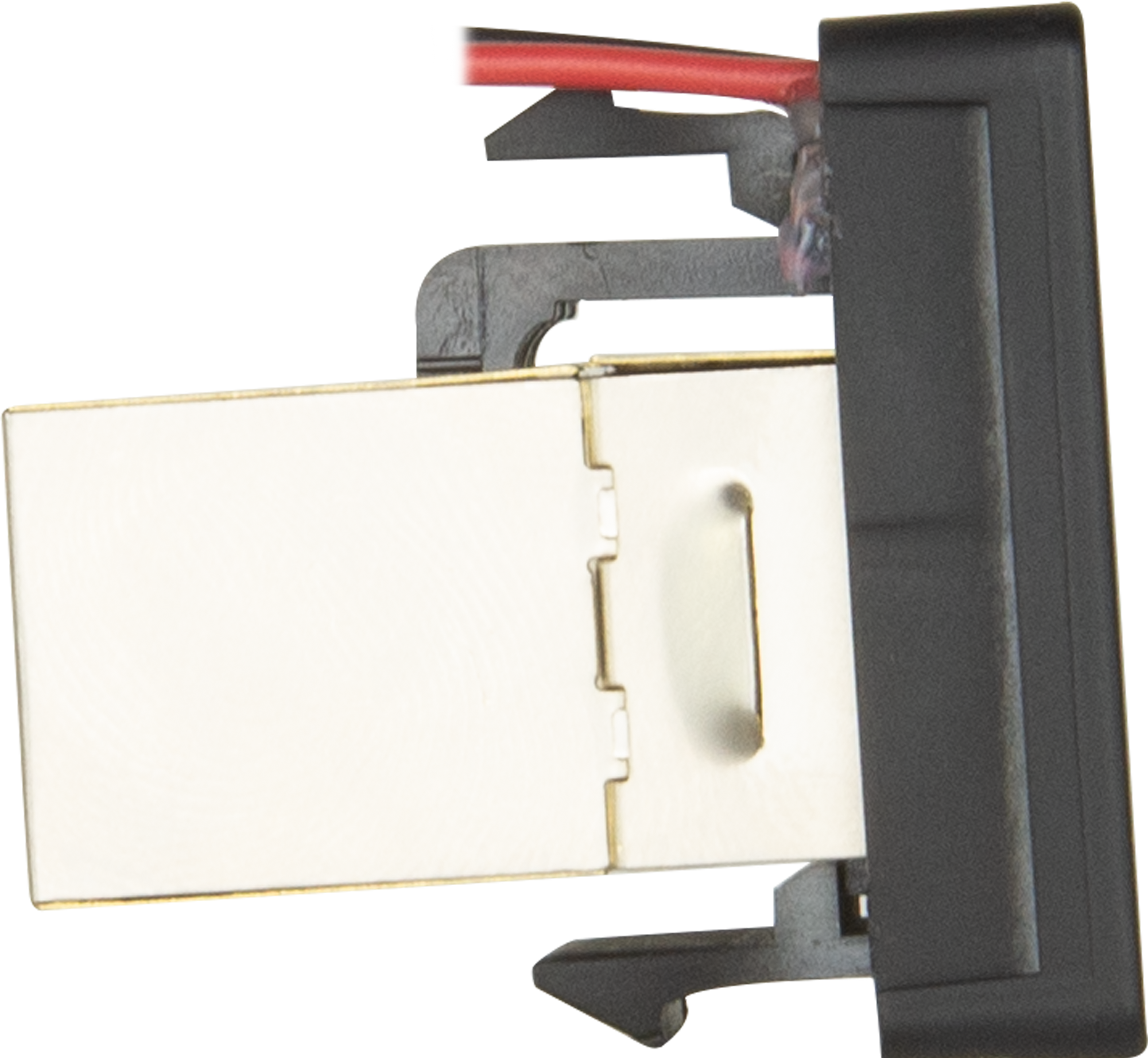 Side view of the switch showing the metal shielded RJ45 body, clip lugs and red and black wires