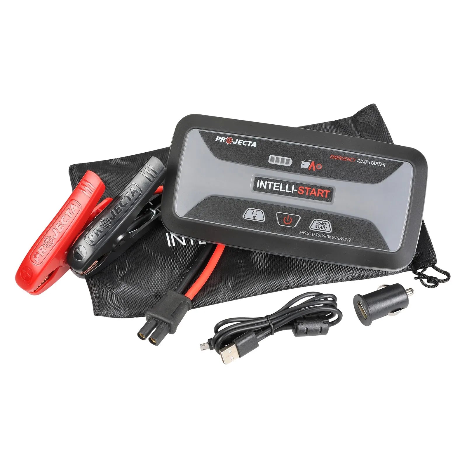 The image shows a black Projecta IS1220 emergency jump starter with cables, a power bank, and LED flood lights, placed on a red and black carrying bag.