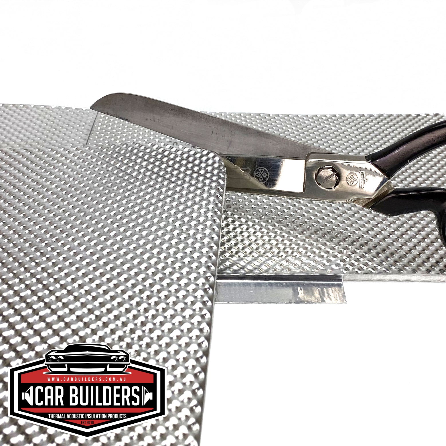 Cutting Car Builders Peel and Stick Heat Shield with tin snips