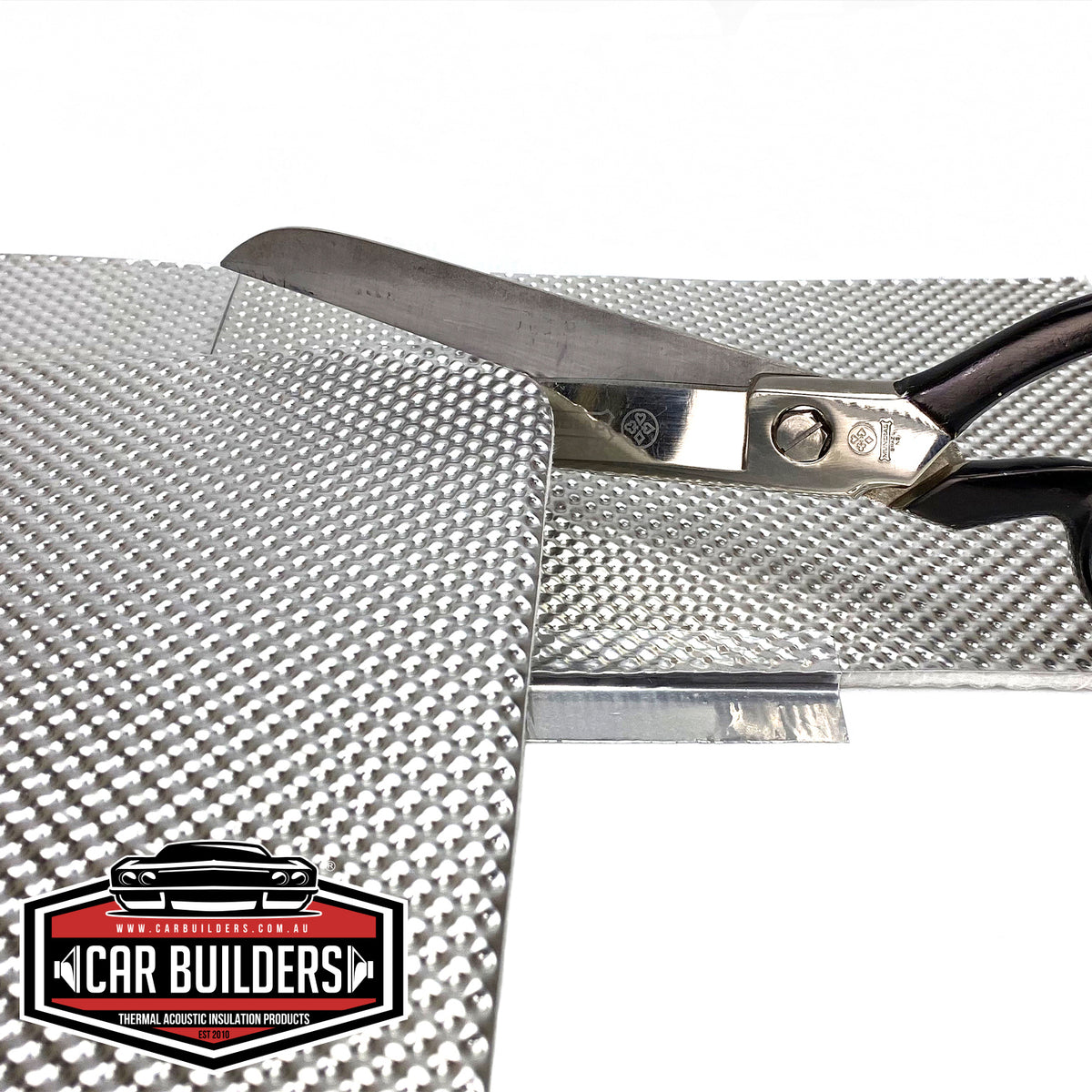Cutting Car Builders Peel and Stick Heat Shield with tin snips