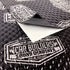 Black printed sound deadener sheet with release liner peeled back