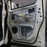 Door card membrane refitted to an open car door with Seal It