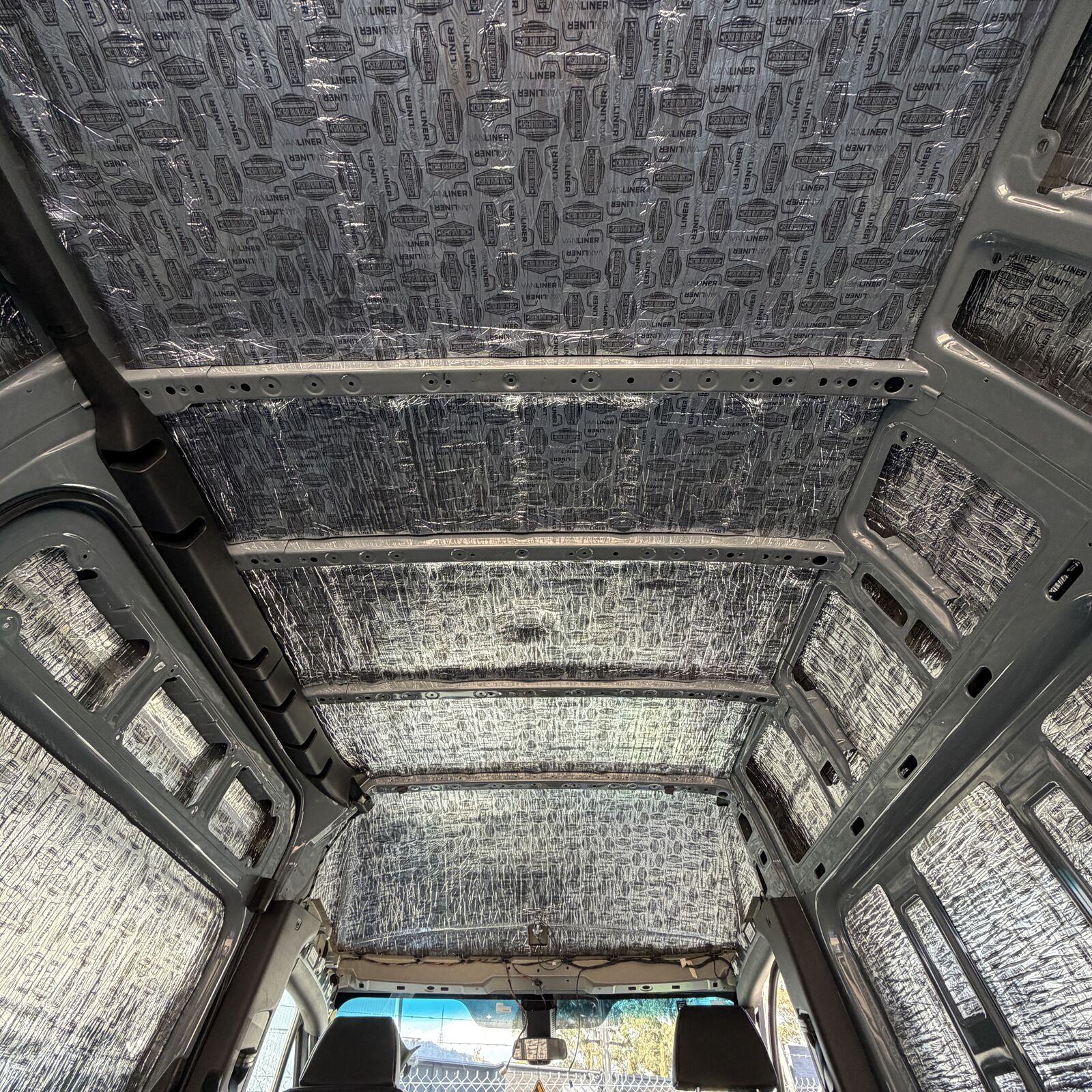 Sprinter roof skin lined with Van Liner between the roof ribs