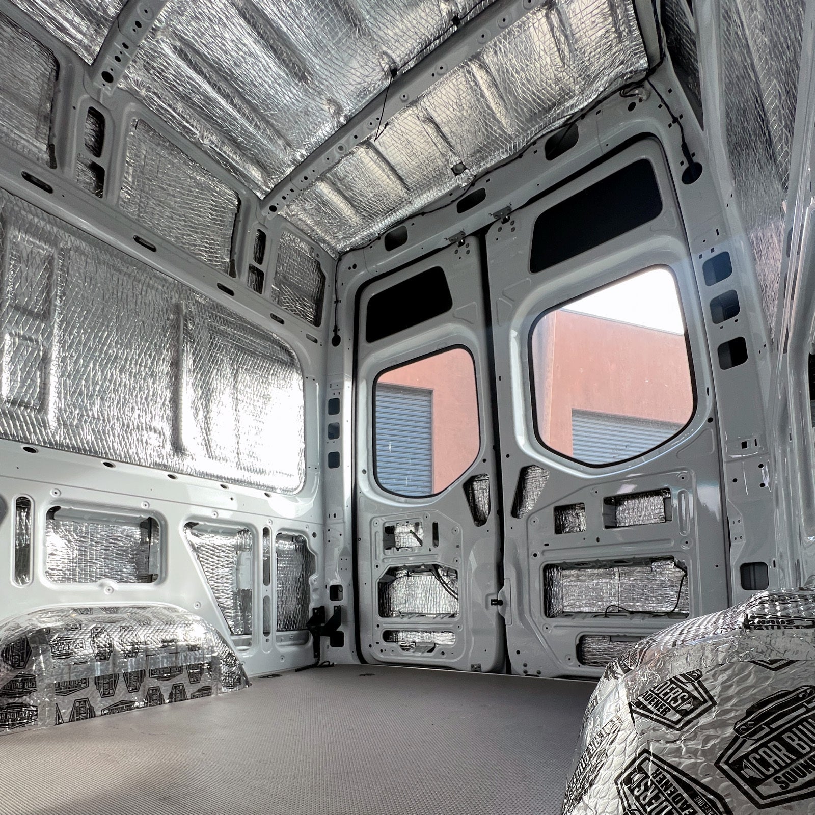 Sprinter rear doors and side walls lined with Van Liner