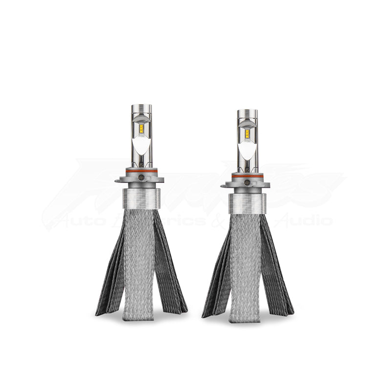 pair of STEDI Copper Head LED Bulbs designed for vehicle headlights, showing the bulbs with a clear cover and silver-colored cooling fins.