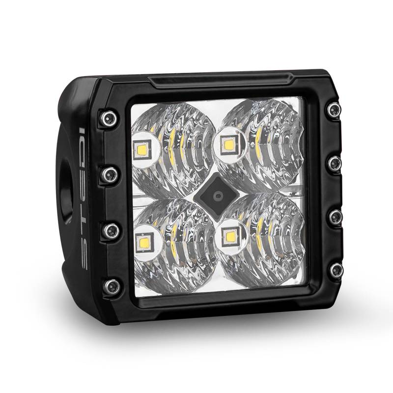 Black Edition Flood LED Light Cube with visible LED lights and lens, mounted on a bracket.