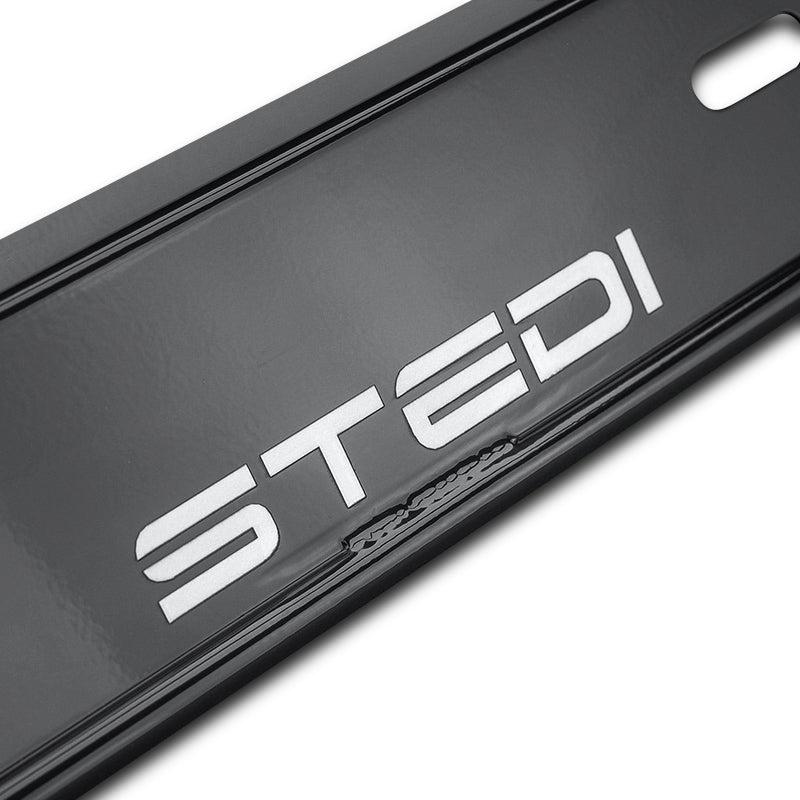Detail view of STEDI logo on satin black number plate light mounting bracket