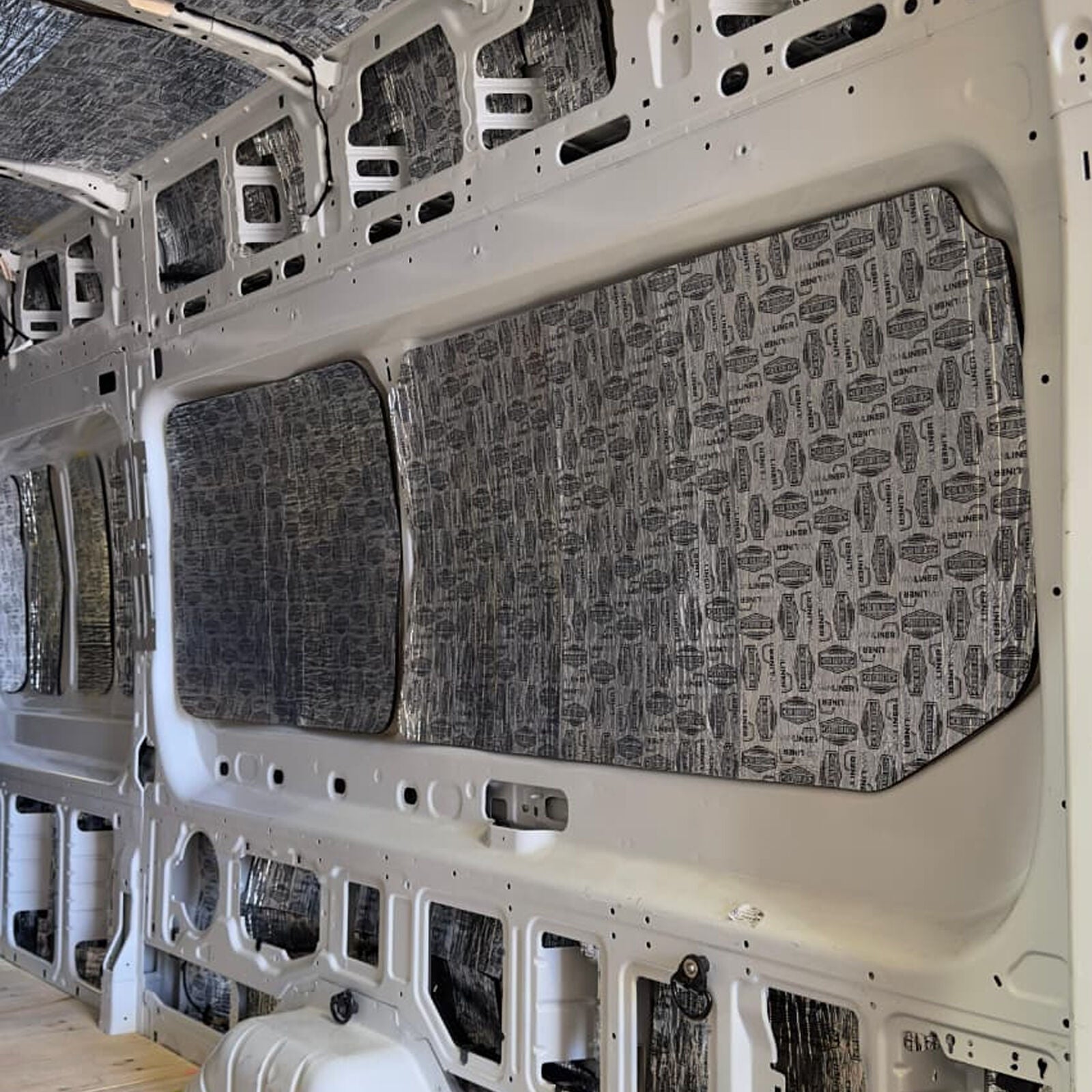 Large Transit side wall panel treated with Car Builders deadener