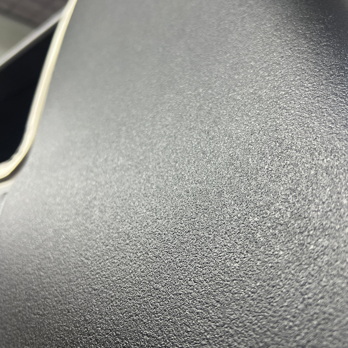 Close up of the black texture finish from TXT 1K