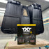 Car seats coated in black TXT 2K beside the kit box in a spray booth