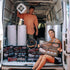 Couple standing beside a van with a Car Builders van pack